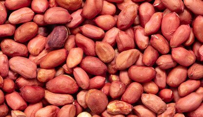 Close up of peanut nuts as background. Macro