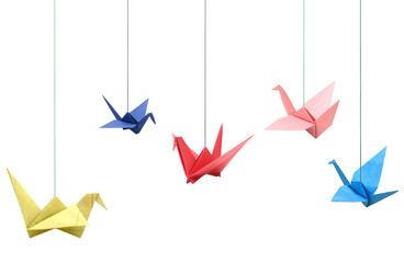 Hanging colorful origami paper birds on white