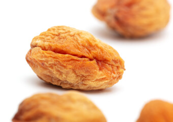 Dried apricots isolated on a white background.