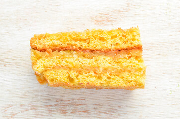 Delicious sweet cake with lemon and zest. Top view. Free space for your text.