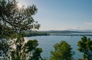 Summer panoramic seascape. View of the bridge on the coast of Corfu. The Ionian Archipelago. Greece.