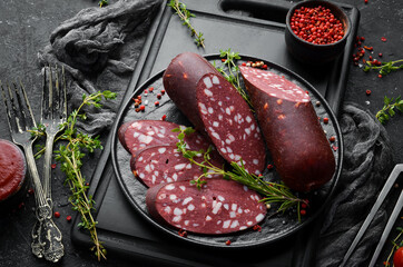 Salami with lard. Moscow traditional sausage. Top view. Free space for text.