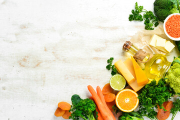 Set of vegetables, fruits and organic foods rich in vitamin A. Top view. Free space for your text.