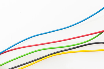 Colored wires on white background