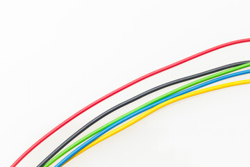 Colored wires on white background