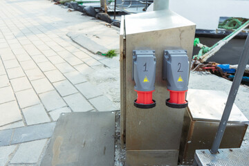 Outdoor electrical outlets in the city. Power supply point for urban utilities. Electrical outlet...