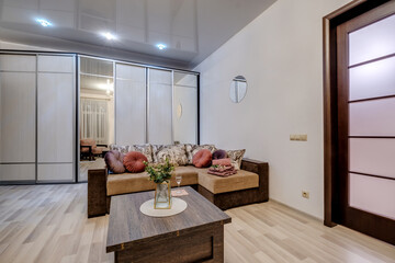 Interior of modern luxure living room in studio apartments in light pink color style