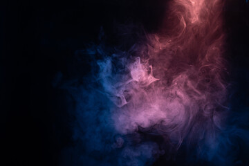 Blue and pink steam on a black background.