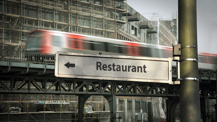 Street Sign to Restaurant