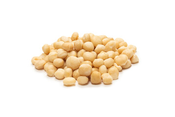 Macadamia nuts isolated on white background.