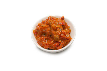 Vegetable stew in a bowl isolated on white background.