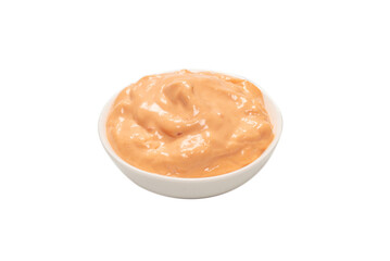 Sauce in a bowl isolated on white.