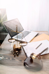 Business and lawyers discussing contract papers with brass scale on desk in office. Law, legal services, advice, justice and law concept picture with film grain effect