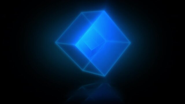 Big blue rotating 3D glass cube with a small cube inside rotating in unison projecting a reflection on a glossy surface. A seamless looping animation. The blue color version of the series.