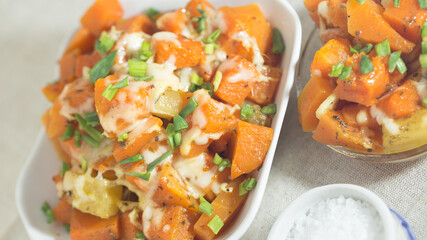 A dish of pumpkin and potatoes in sour cream sauce