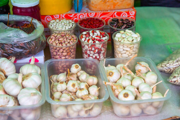 Beans and garlic are sold in the vegetable market