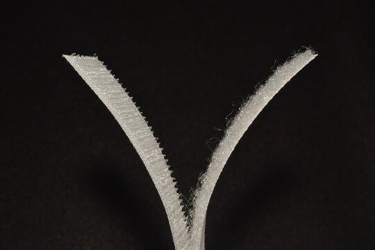 Velcro tape isolated on black background.