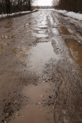 Dirty dirt road after rain.