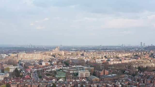 Dolly forward drone shot over suburban north London near alexandra palace