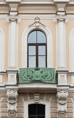 Windows on old city facades, with decorative elements