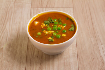 Mutter Paneer , Indian Dish Cottage cheese and Peas immersed in an Onion Tomato Gravy