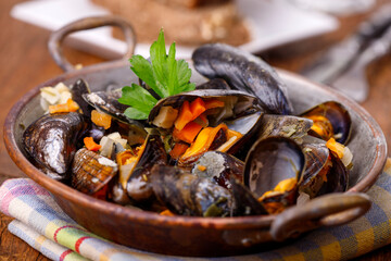mussels on dark wood