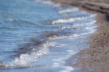 Beautiful surf. The beach is made of sand and shells. Rest in the tropics.