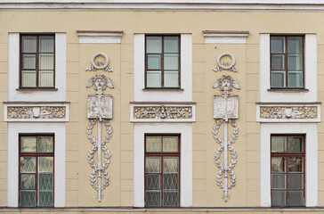 Windows on old city facades, with decorative elements