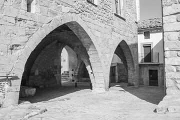 Ares del Maestrat City hall, Castellon province, Valencian Community, Spain. Beautiful historic medieval village on top of a hill. Black and white photography (monochrome).