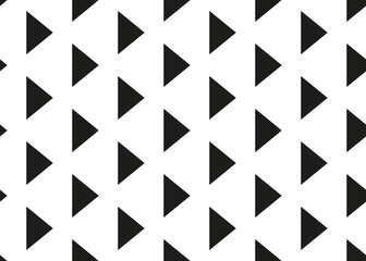 Triangles on a white background. Seamless texture.