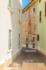 Picturesque small town street view in Lazisa, Lake Garda Italy.