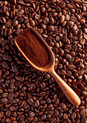 Wood scoop with ground coffee on beans background