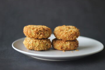 Light brown color chicken cutlets made in the air fryer.