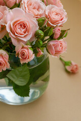 Bouquet of small tender pink roses close up