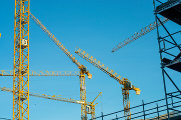 construction site with tall yellow crane