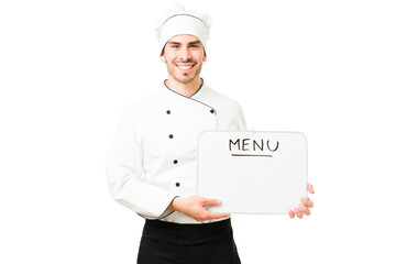 Portrait of a chef changing the menu of a restaurant
