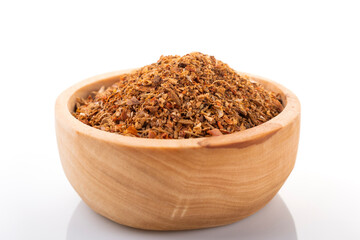 Ras el hanout moroccan spice. Ras el hanout in wooden bowl, on white background. Moroccan spice