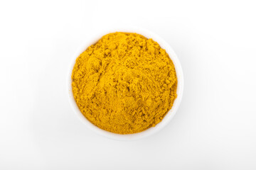 Curry powder. Curry powder in white bowl, on white background. Curry
