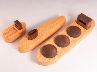 Collection of handmade wooden boats. Switching orientation.