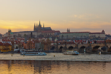 Fototapeta na wymiar View over Vltava river or Moldau in Prague towards Prague castle and cathedral.