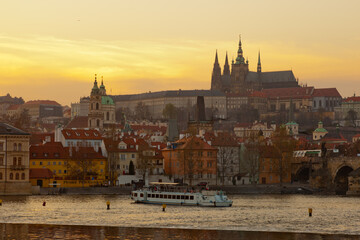 Naklejka premium View over Vltava river or Moldau in Prague towards Prague castle and cathedral.