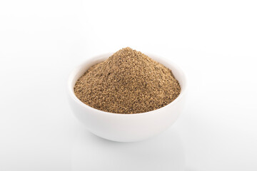 Black pepper. Black pepper in white bowl, on white background. Black pepper powder.