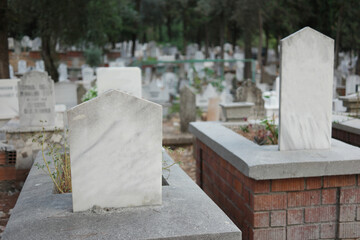 Graves and headstones at Muslim cemetery. Graves background.