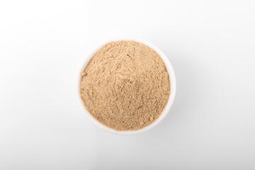 Cardamom powder. Cardamom powder in white bowl, on white background. Cardamom, Cardamom powder
