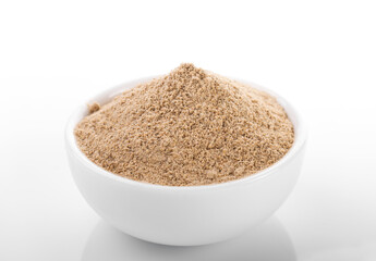 Cardamom powder. Cardamom powder in white bowl, on white background. Cardamom, Cardamom powder