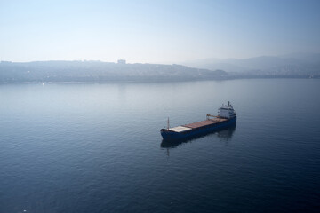 Sea skyline behind a ship. View of blue sea.
