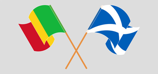 Crossed and waving flags of Scotland and Mali