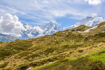 Crossing the Alps. Hiking trail in the Alps.