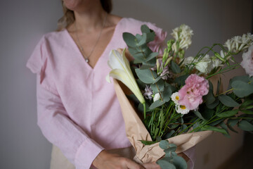 person with bouquet of flowers
