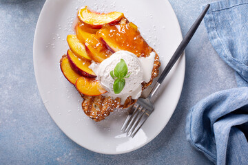 French toast with peaches and vanilla ice cream